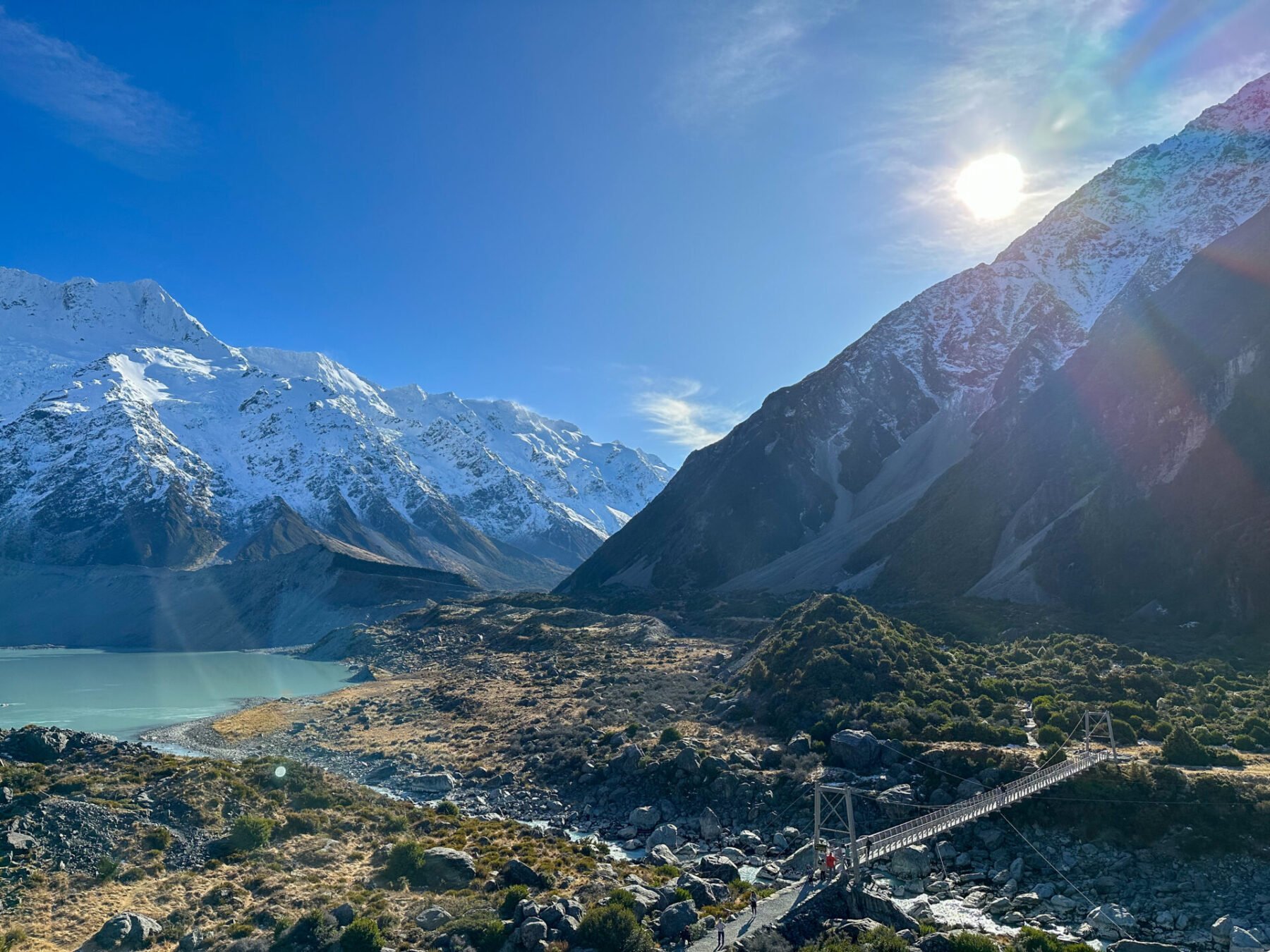 Hooker Valley Track: A Guide to Mount Cook's Stunning Hike 5 First swing bridge and Mueller Lake in Hooker Valley
